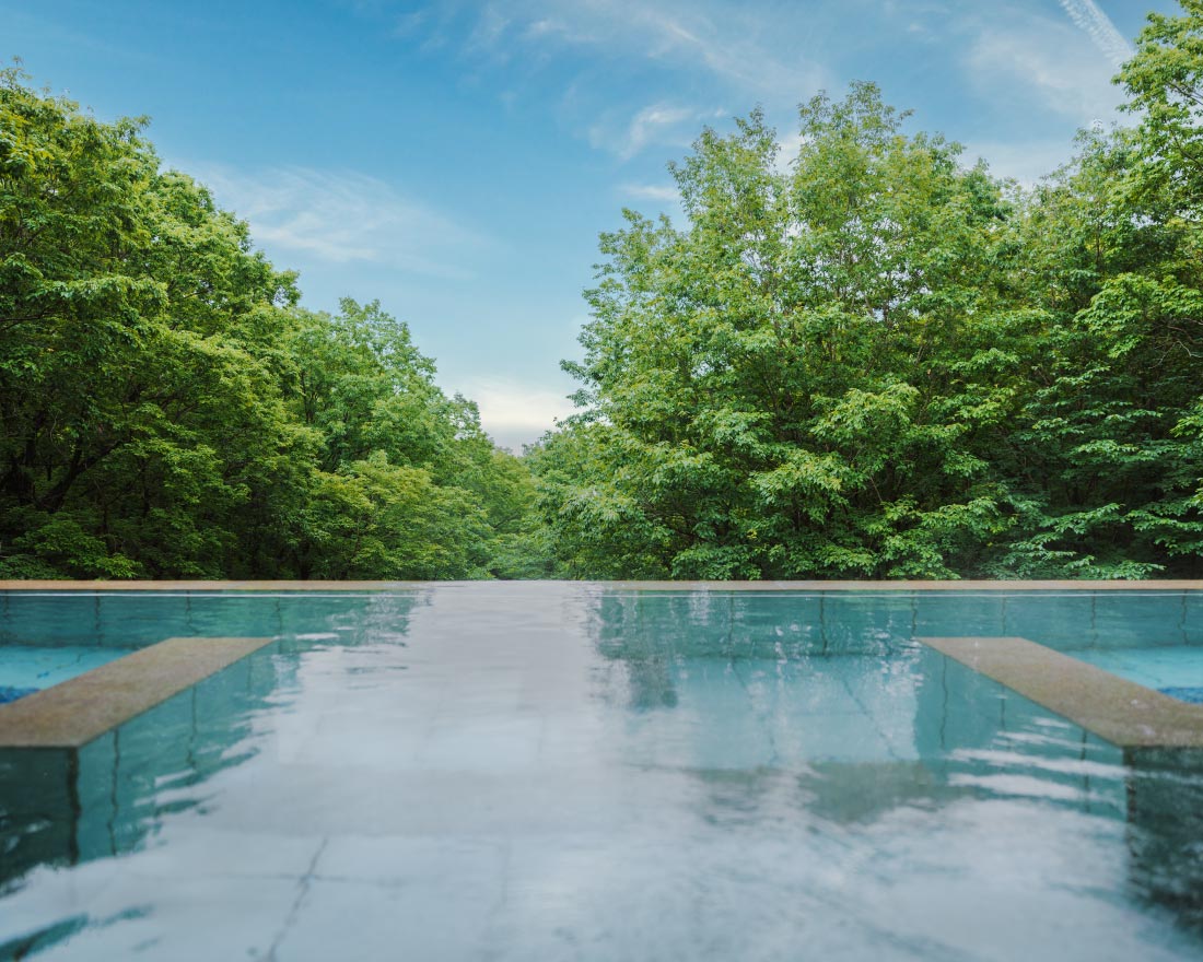 Open-air bath in the forest.