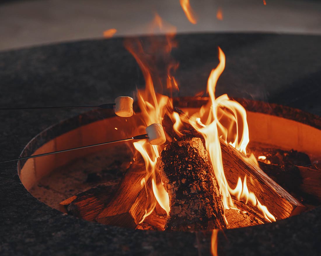 Roast marshmallows by the fire.
